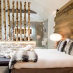 Suite chalet avec spa, piscine et jacuzzi pour séjour romantique